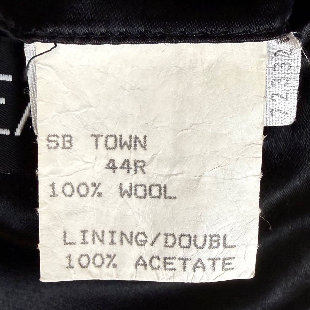 Cardinal SB Town model label showing men's size 44 Regular, 100% wool and 100% acetate lining