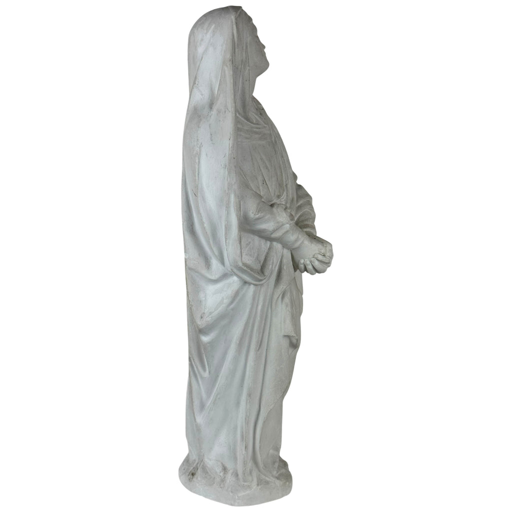 Our Lady of Sorrows statue showing clasped hands and drapery
