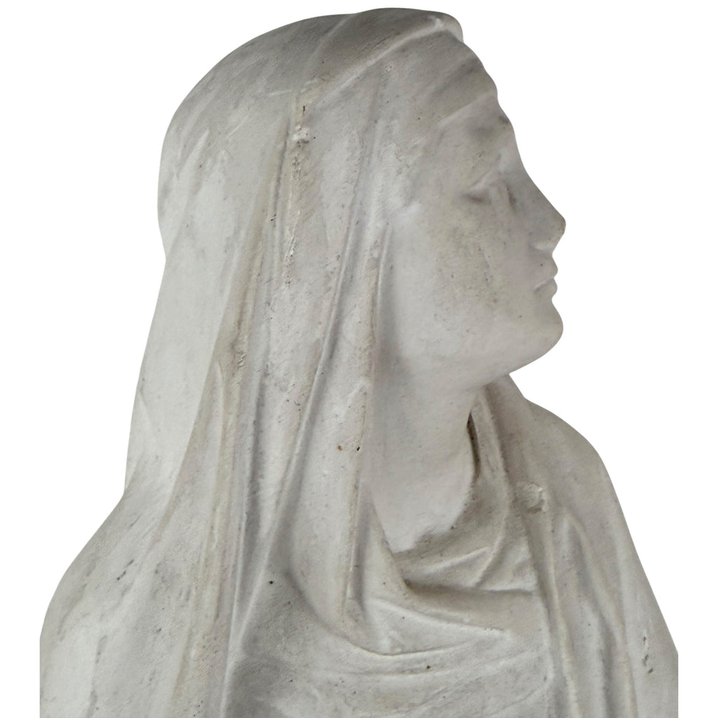 Our Lady of Sorrows plaster statue face and mantle detail