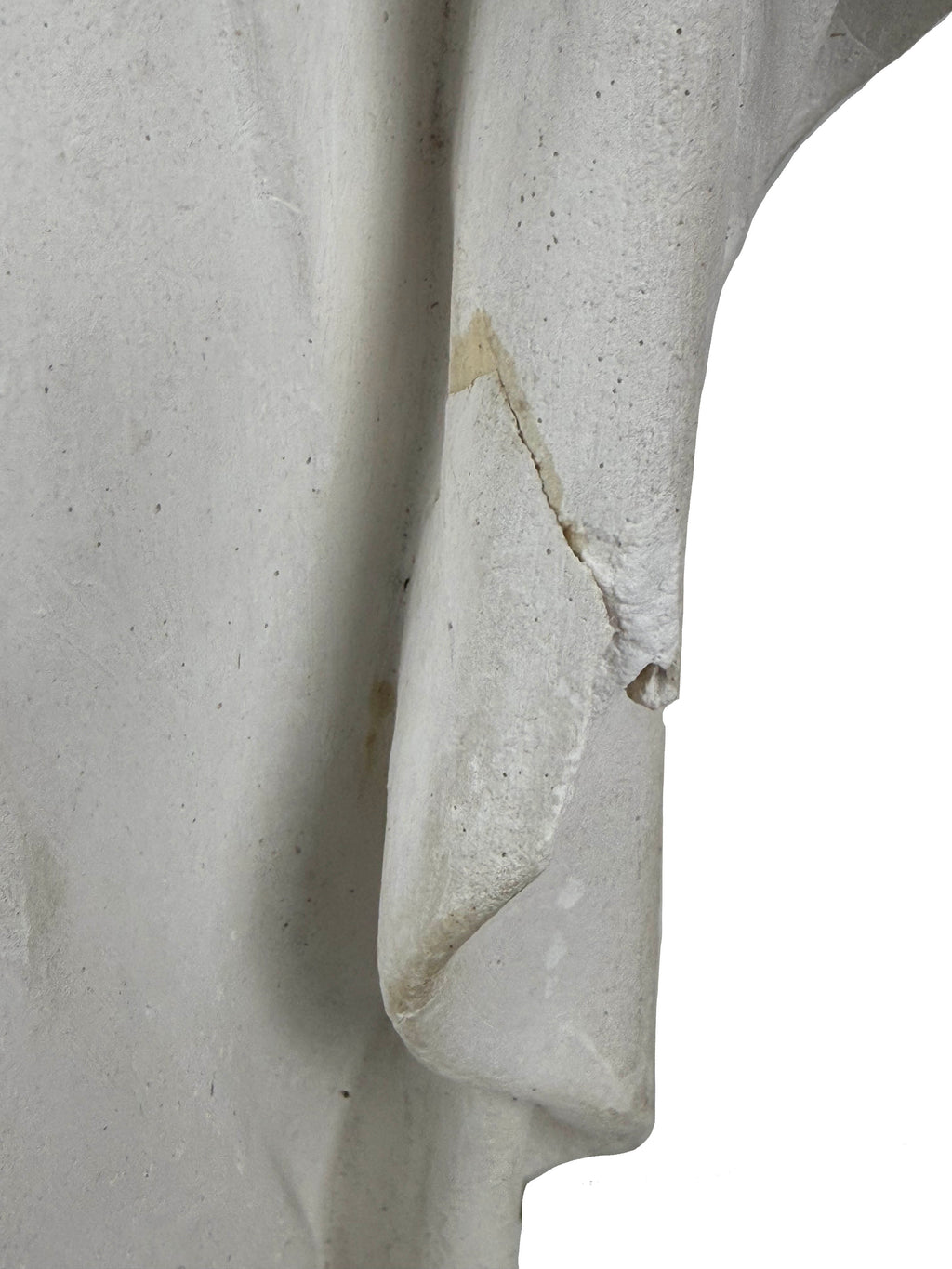 Old repair and plaster loss on Our Lady of Sorrows statue
