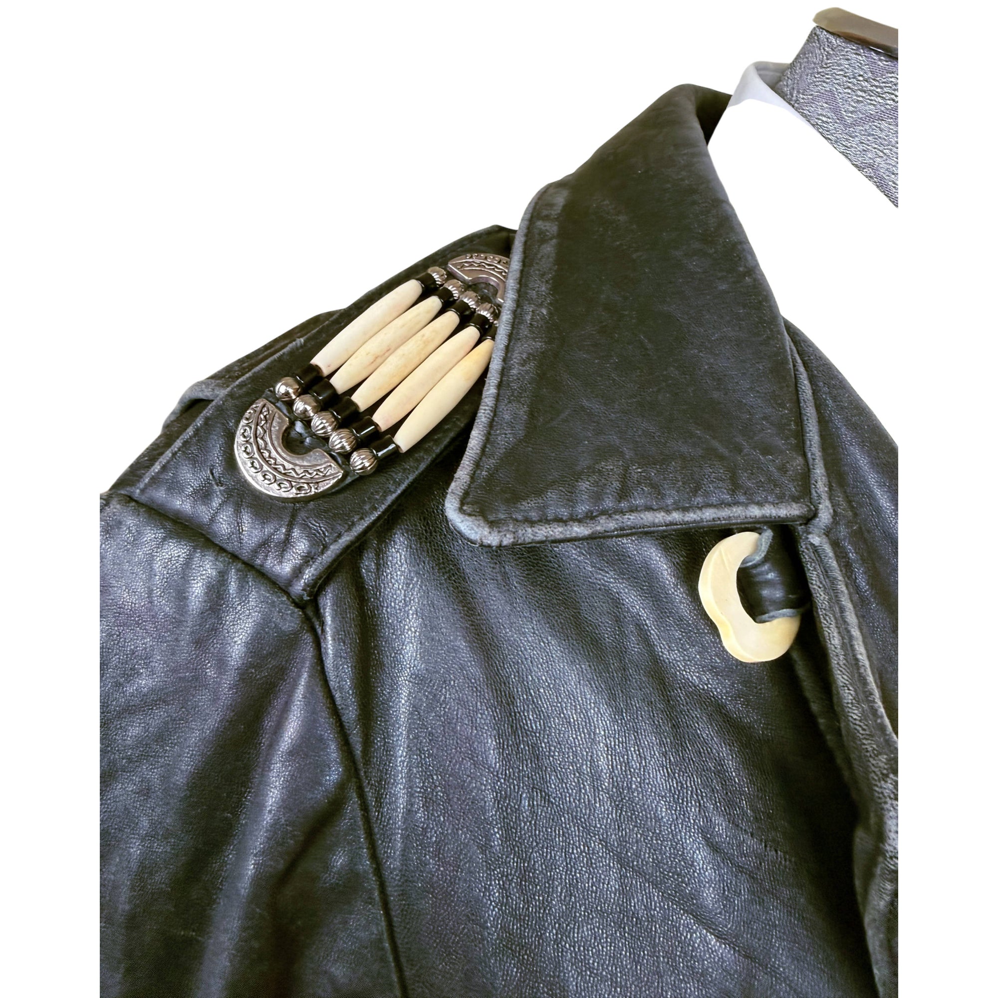hairpipe decoration on shoulders of leather jacket