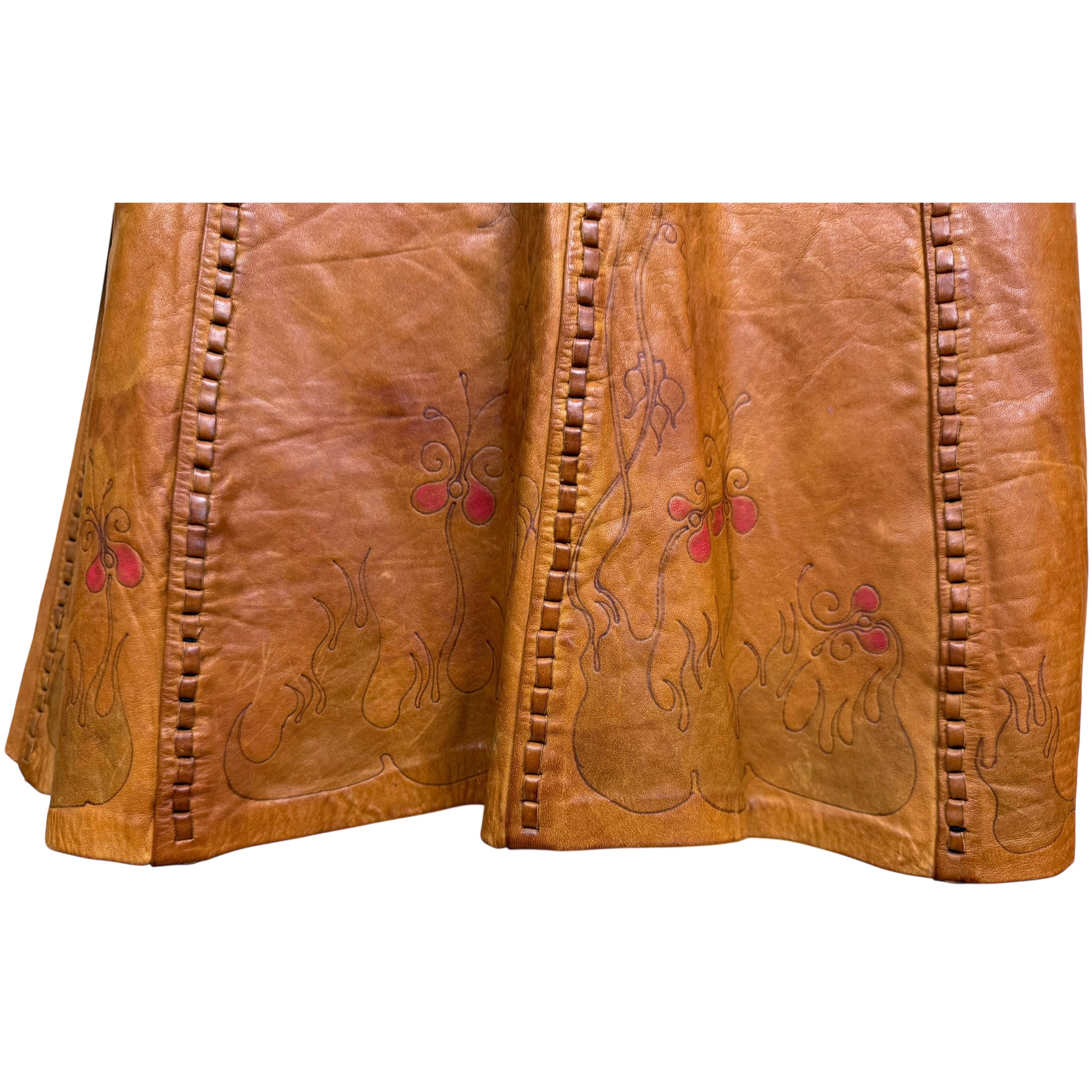 detail of artisan leather pyrography skirt