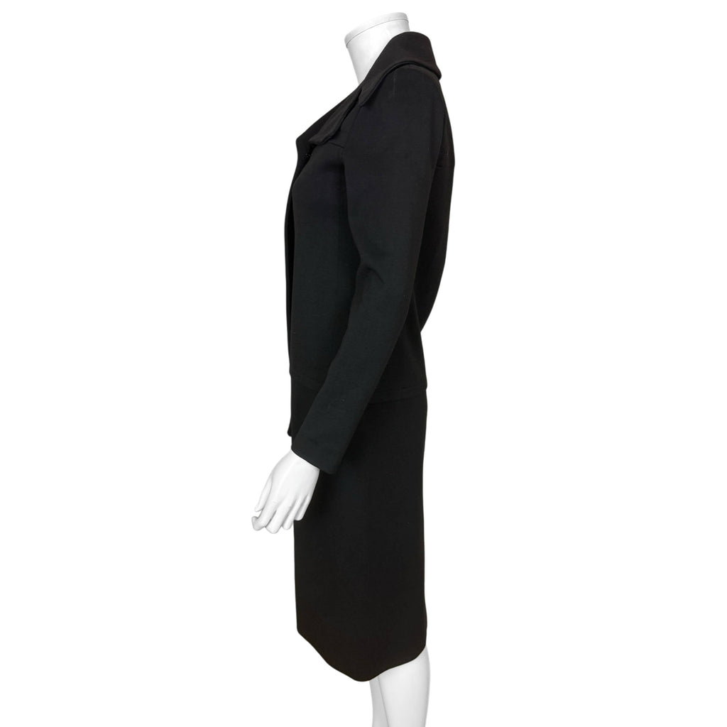 Les Jerseys de Pierre Cardin black wool jersey dress, side profile showing fitted long sleeves and straight skirt