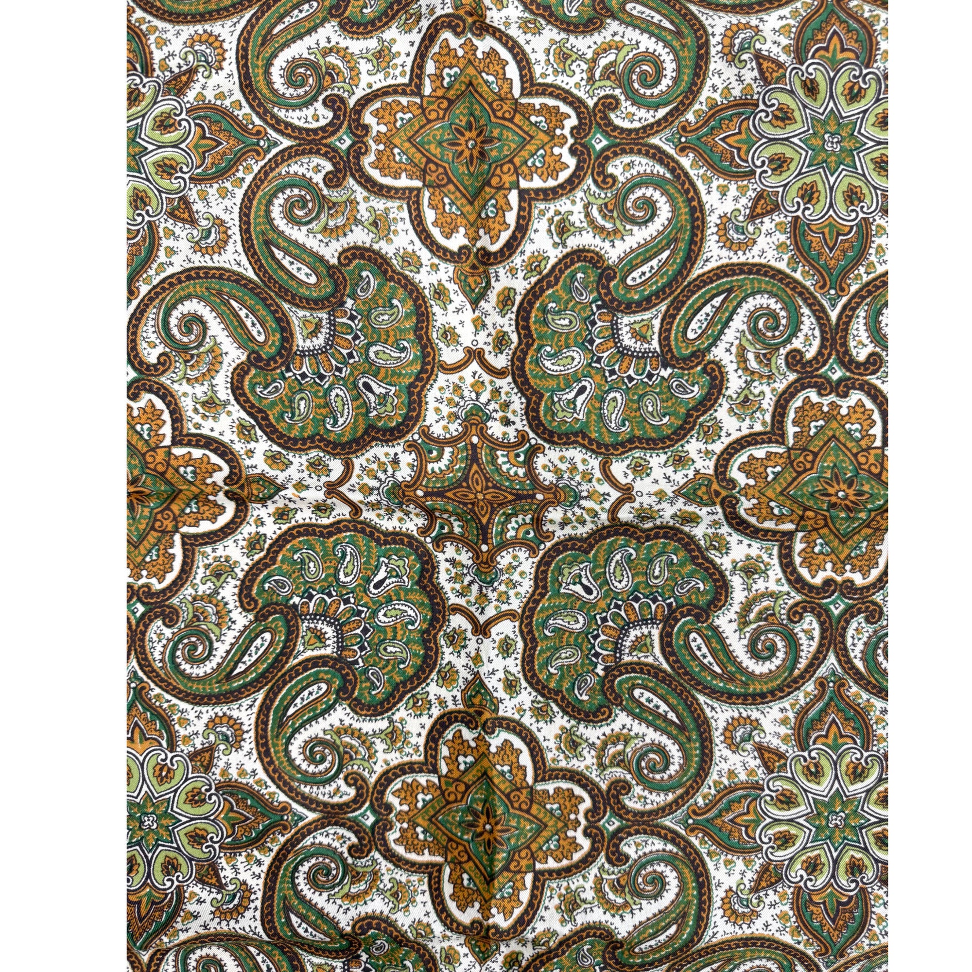 close-up detail of Vintage English silk scarf with decorative paisley pattern 