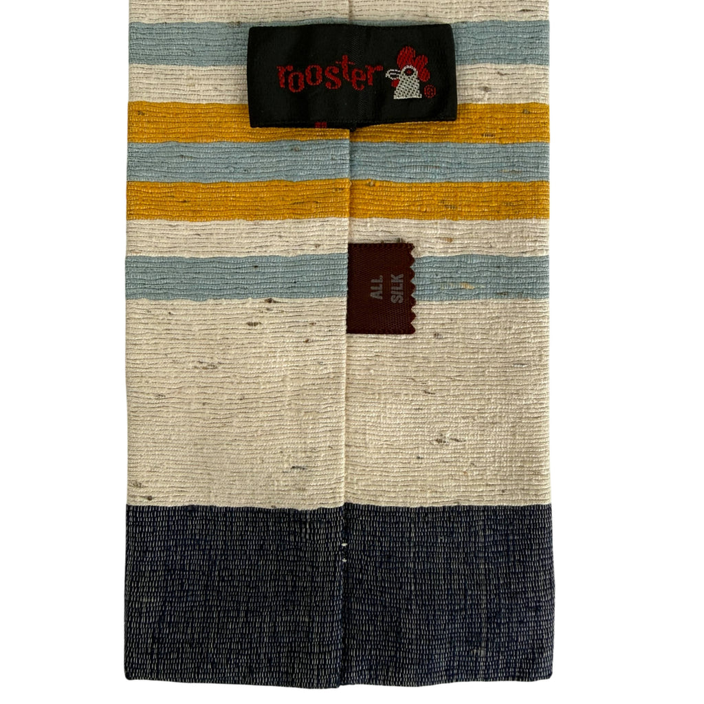 Close-up of Rooster all silk label on vintage striped slub silk tie