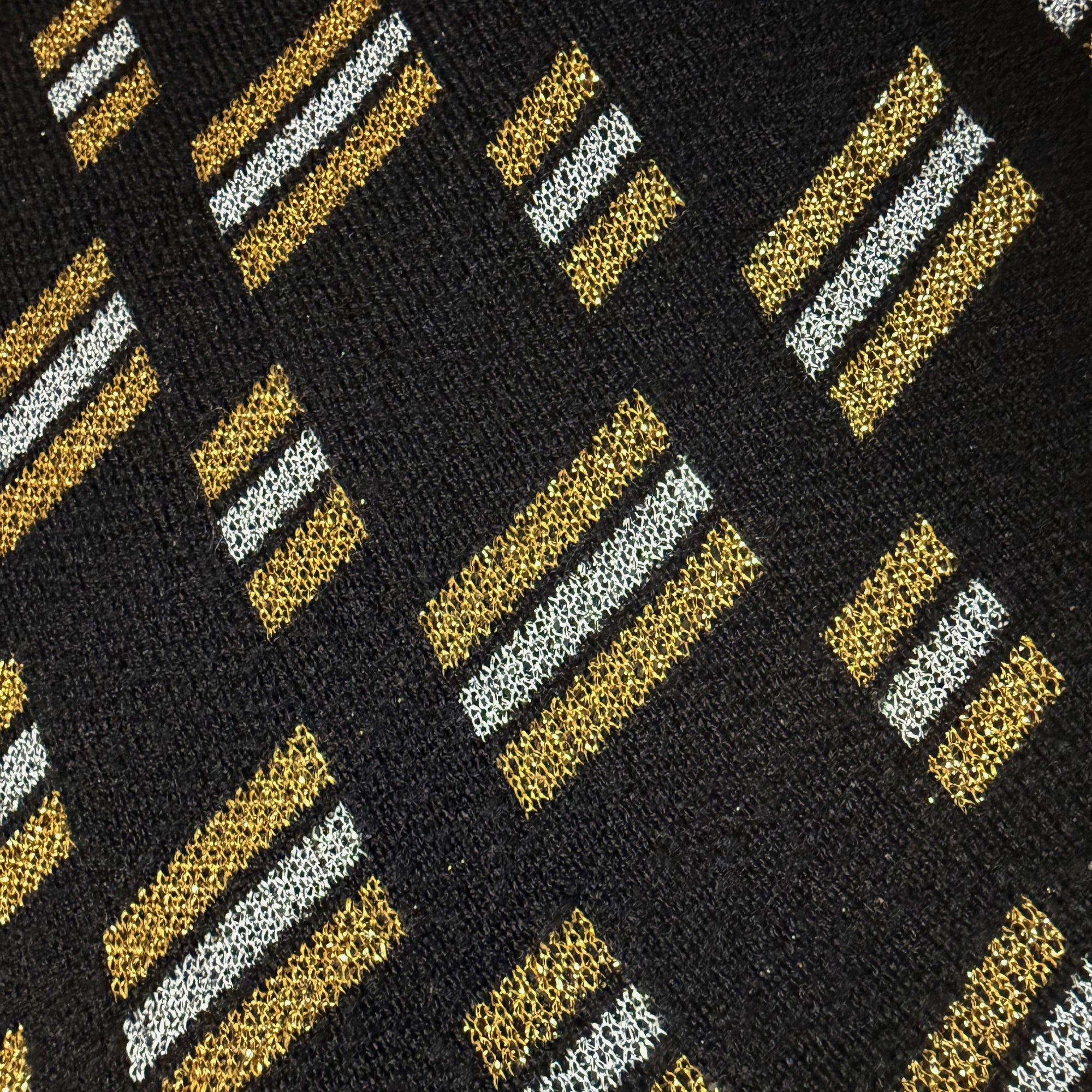 Close-up metallic knit fabric detail