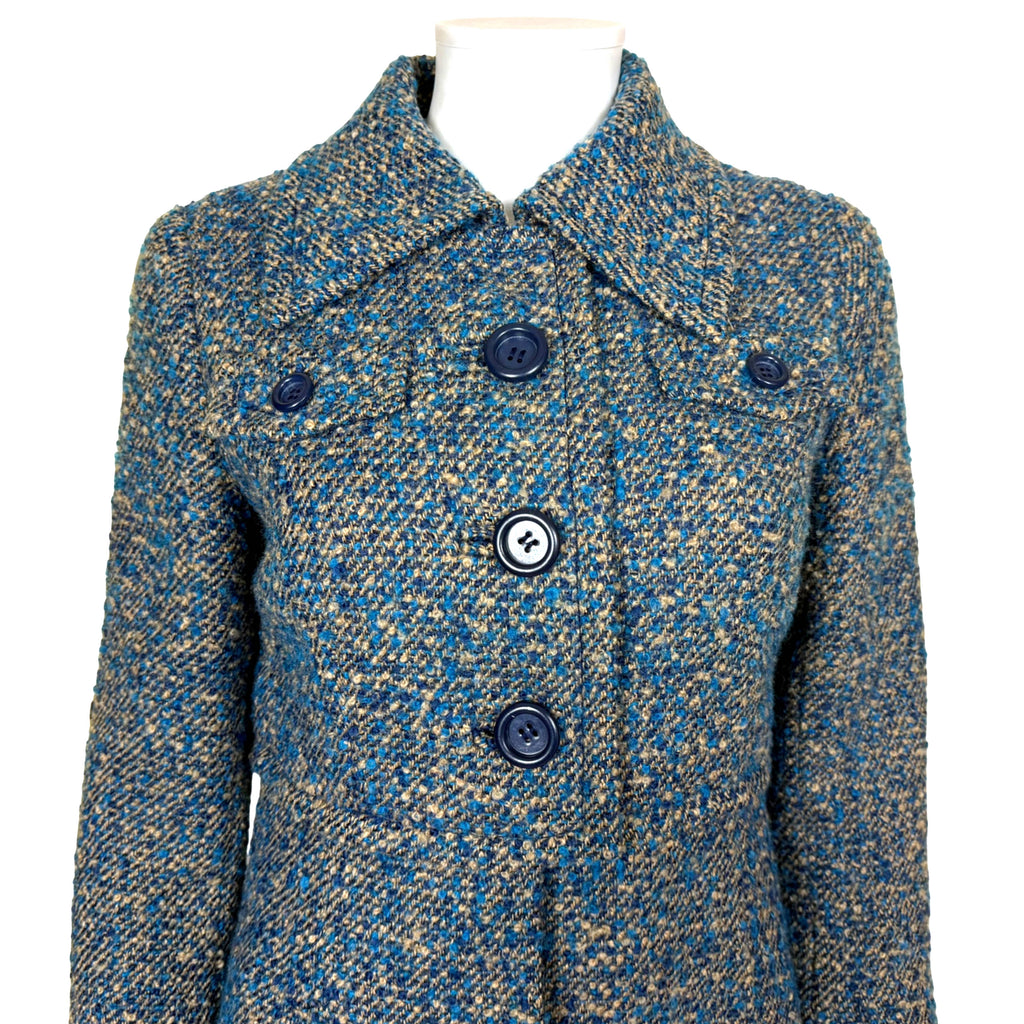 Lydia Modell bouclé coat military inspired bodice pointed collar and navy buttons