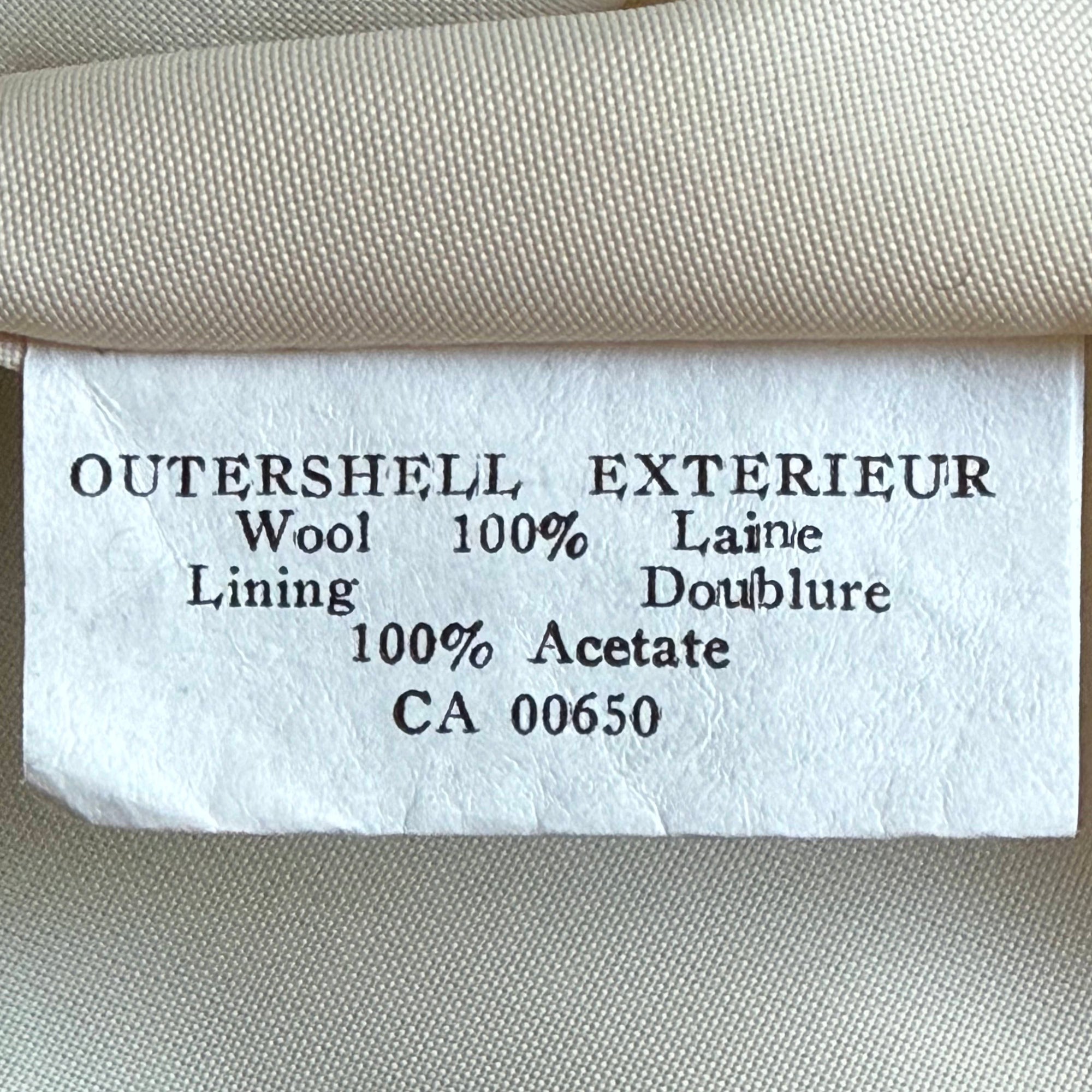 Content label on vintage 1970s green wool spring coat