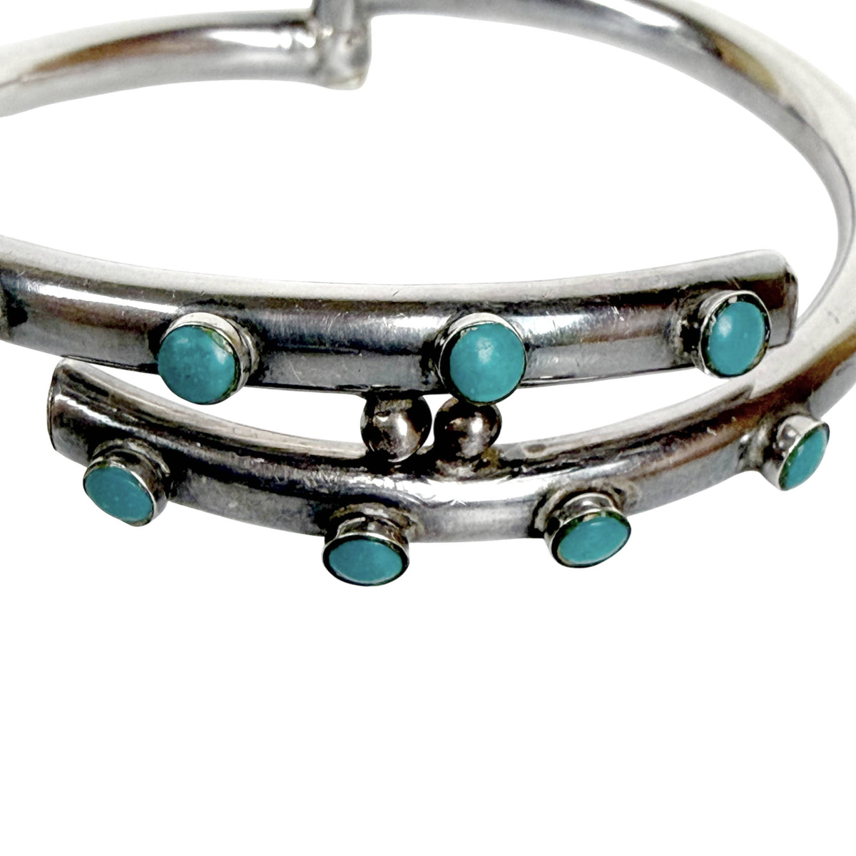 Mid-century Mexican silver cuff bracelet with eight turquoise cabochons