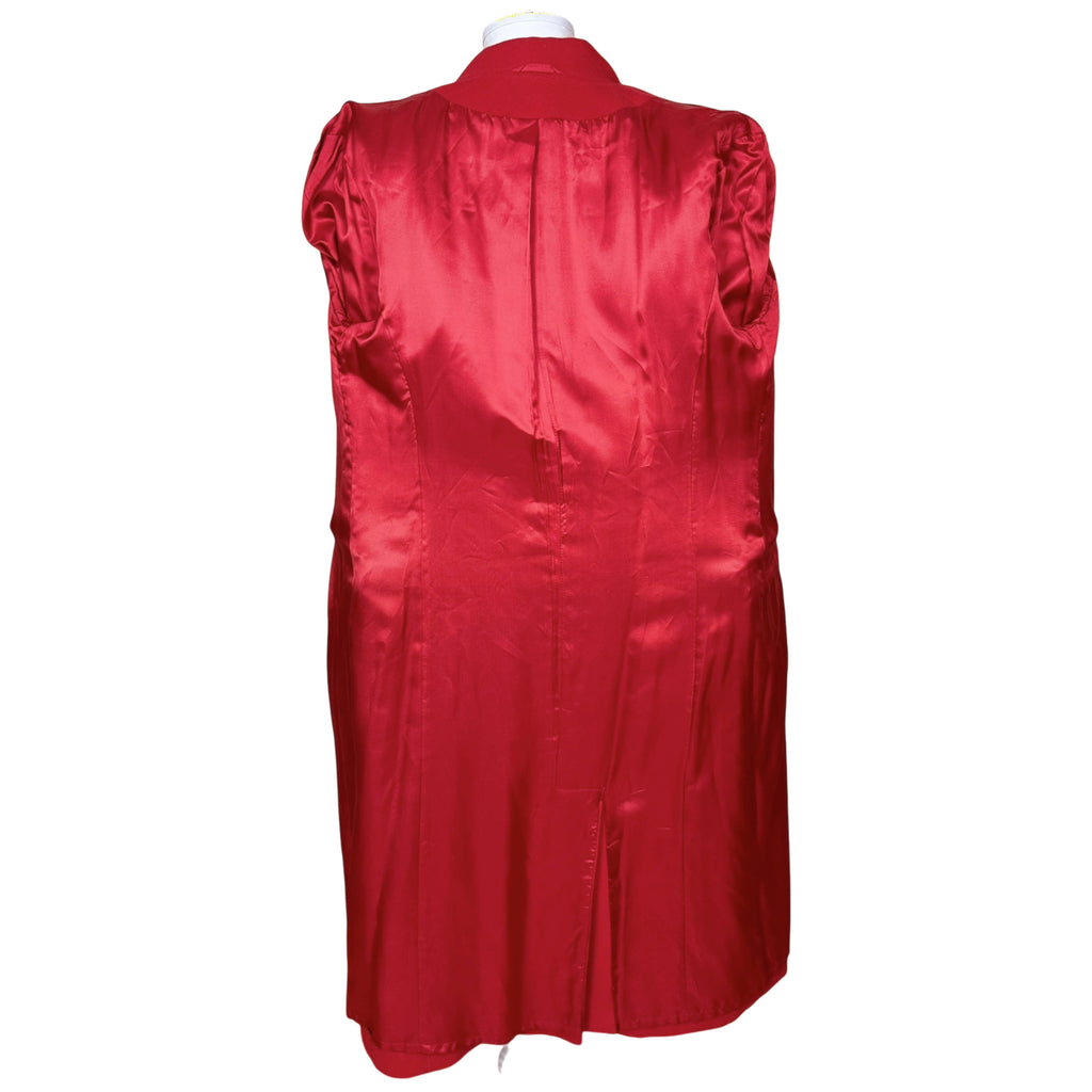Interior of Mondi coat showing red satin-finish lining, back seam and lower vent.