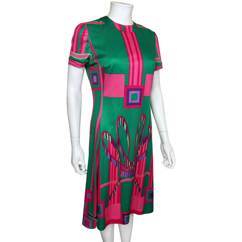 1960s 1970s Montreux Knitting geometric print dress showing fitted bodice and flared skirt from an angle