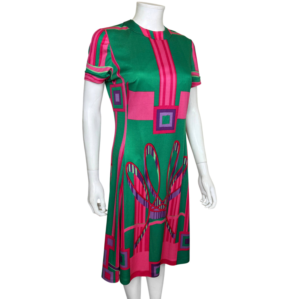 1960s 1970s Montreux Knitting geometric print dress showing fitted bodice and flared skirt from an angle
