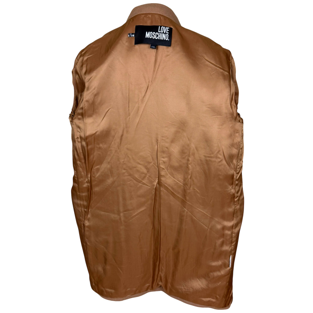 The brand label 'LOVE MOSCHINO' on coat lining