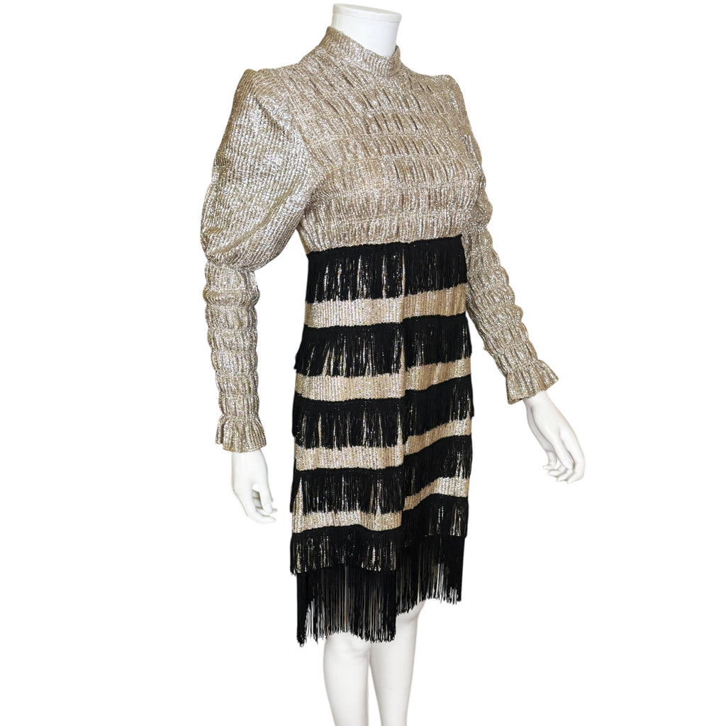 Side profile of 1960s metallic fringe cocktail dress