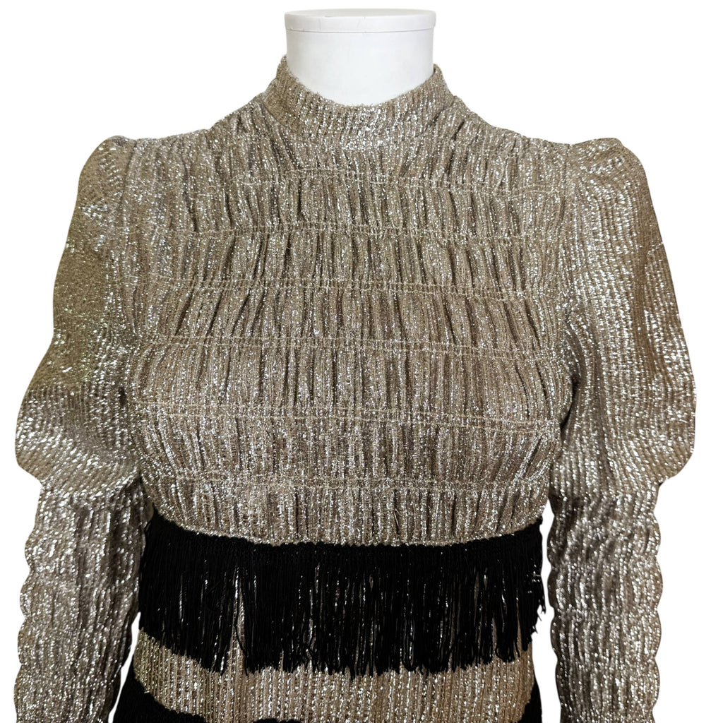 Detail of metallic textured knit fabric on vintage dress