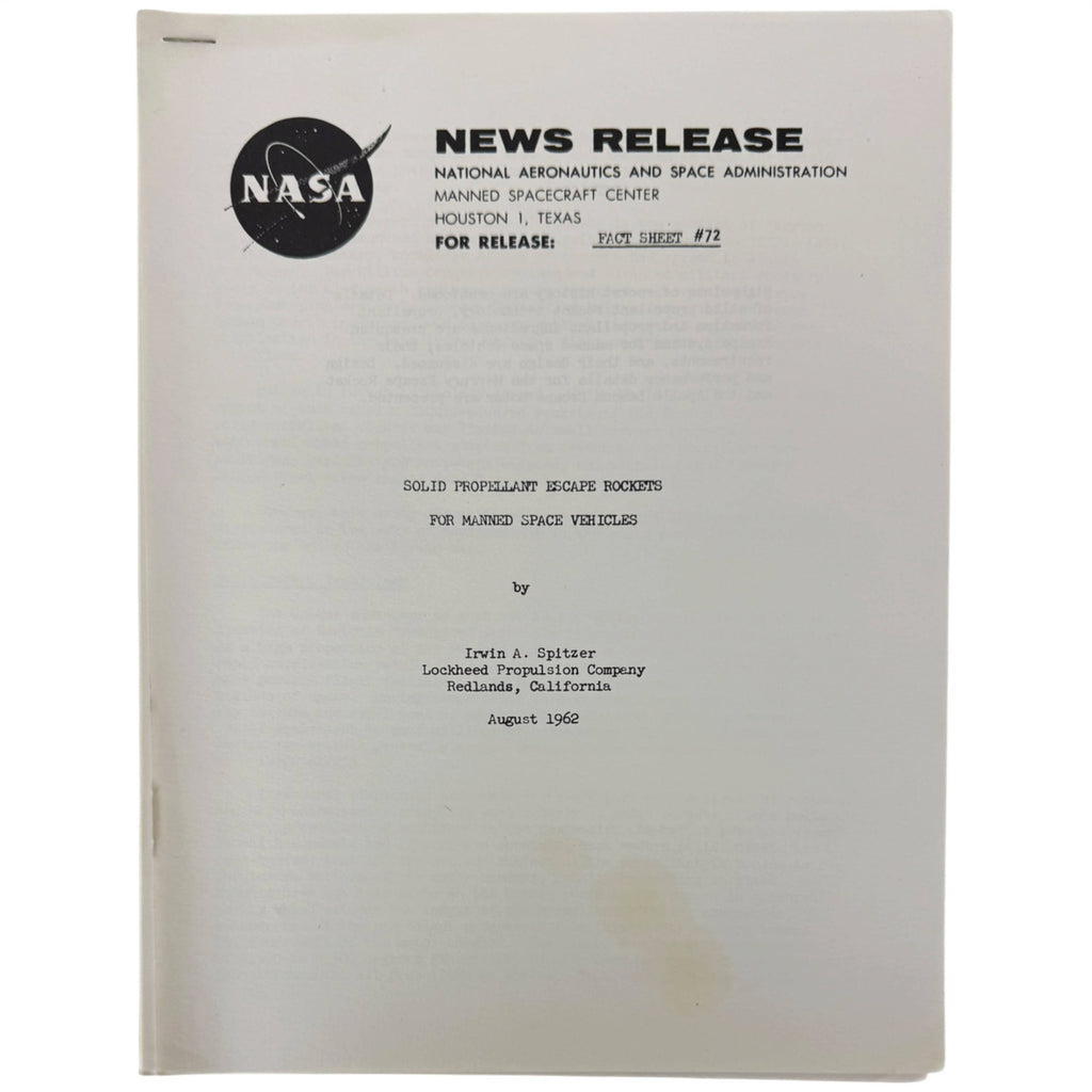 A vintage NASA press release document dated August 1962, featuring the black NASA logo and text about Solid Propellant Escape Rockets for Manned Space Vehicles