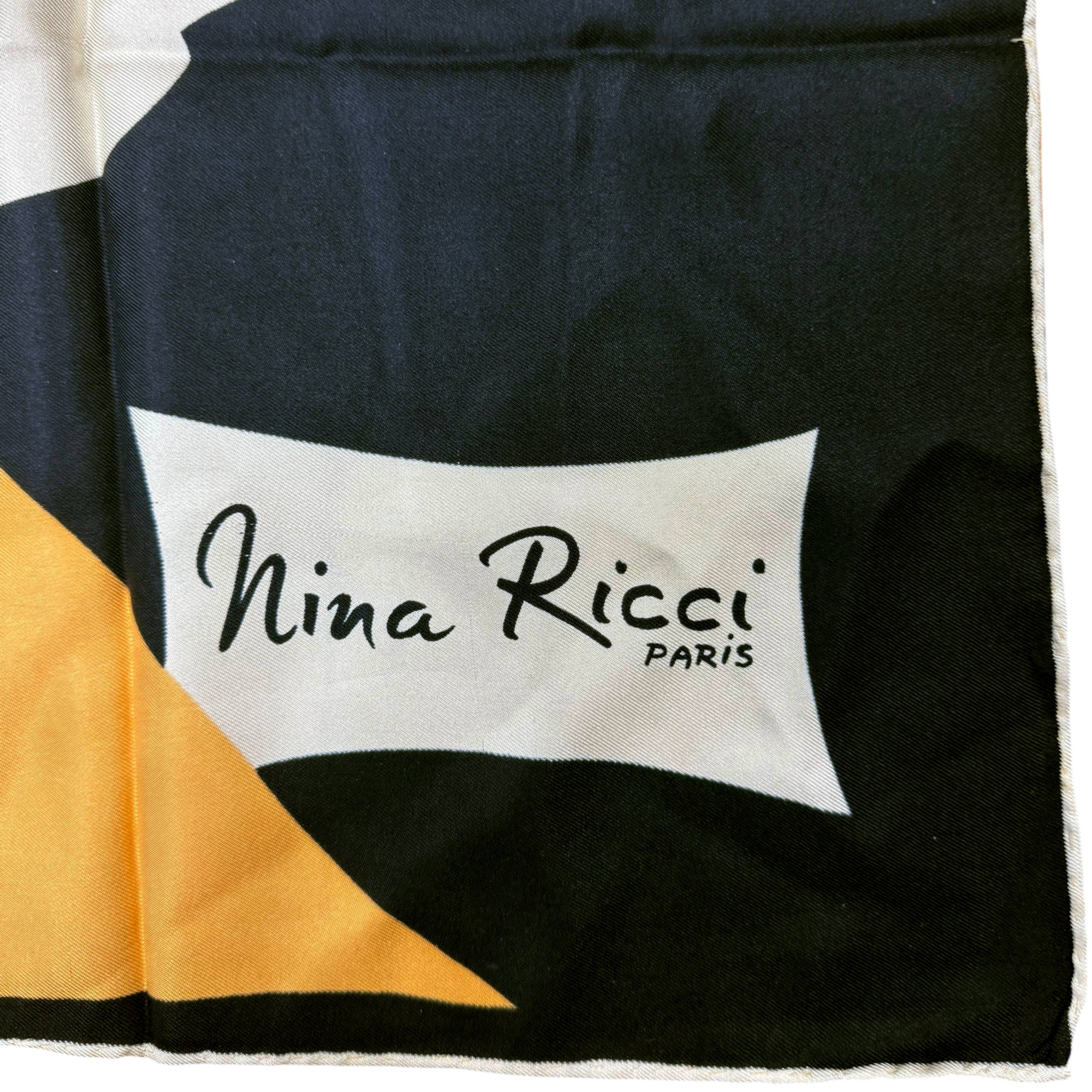 Nina Ricci signature on silk twill scarf
