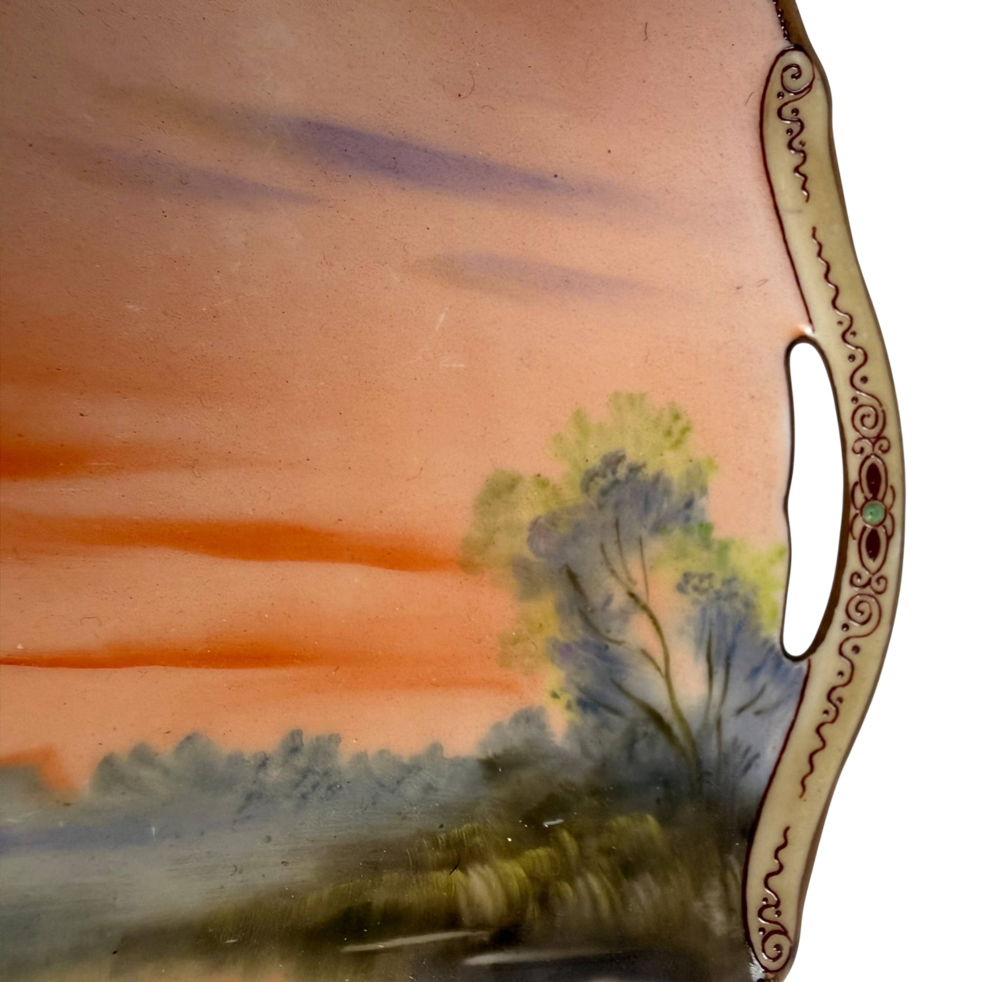 Pierced handle with moriage decoration and green jewel