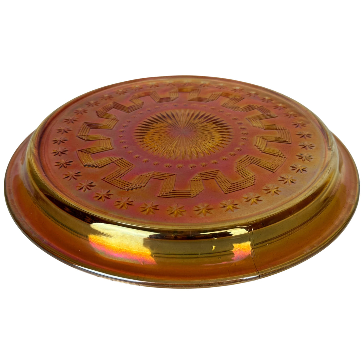 angled underside view of Northwood Holiday marigold carnival glass tray