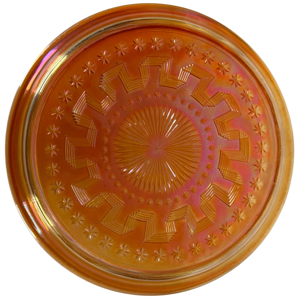 view of underside of Northwood Holiday marigold carnival glass tray