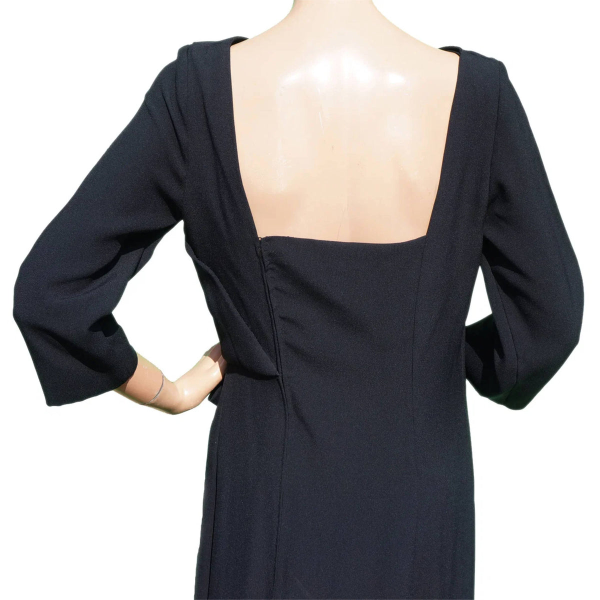 squared open back of Paquin Paris designer gown