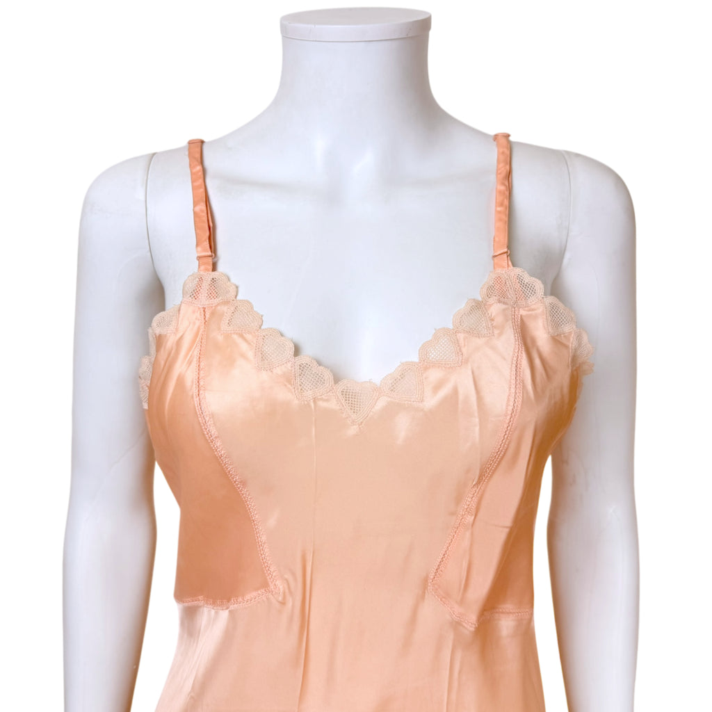 close up of bodice of 1940s rayon satin slip
