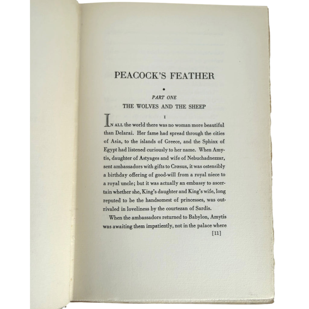An open vintage book showing the first page of 'Peacock's Feather: Part One The Wolves and the Sheep' printed in black serif text on aged off-white paper.