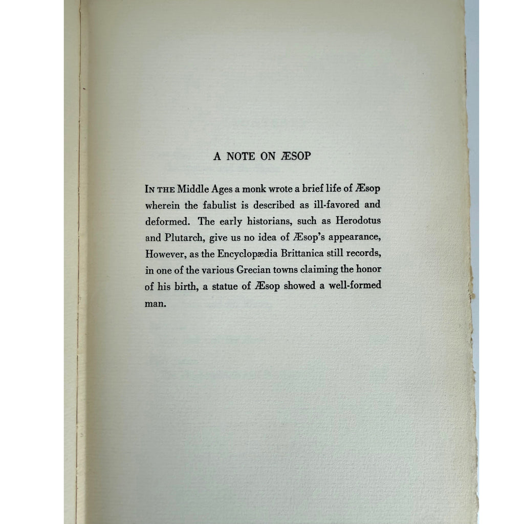 A printed page from a book or booklet showing the title 'A NOTE ON ΞSOP' and a block of black text on an off-white page, photographed against a white background.