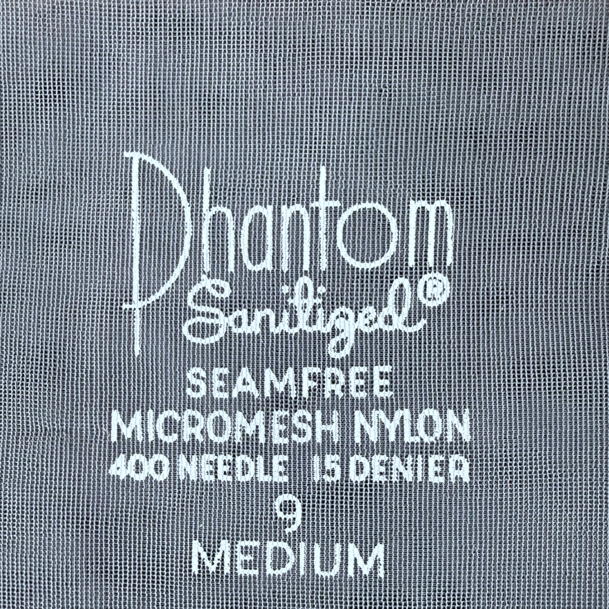 Close-up of a silver blue nylon stocking  text reading 'Phantom Sanitized Seamfree Micromesh Nylon 400 Needle 15 Denier 9 Medium'.