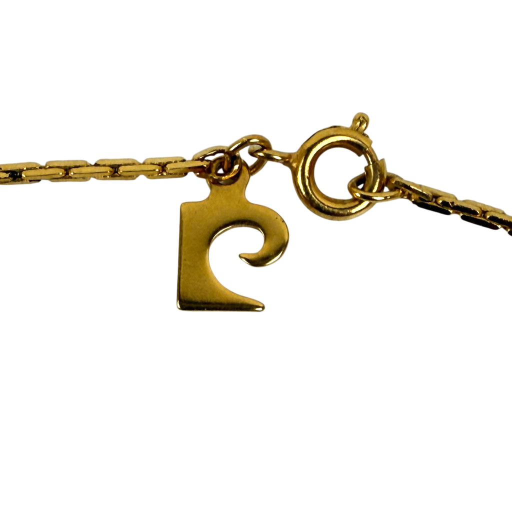 Pierre Cardin logo charm attached beside spring-ring clasp