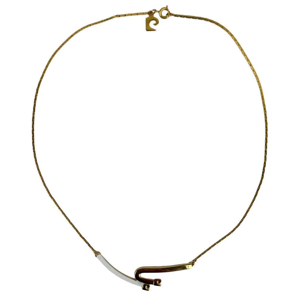 Vintage modernist necklace attributed to Pierre Cardin with gold tone PC pendant