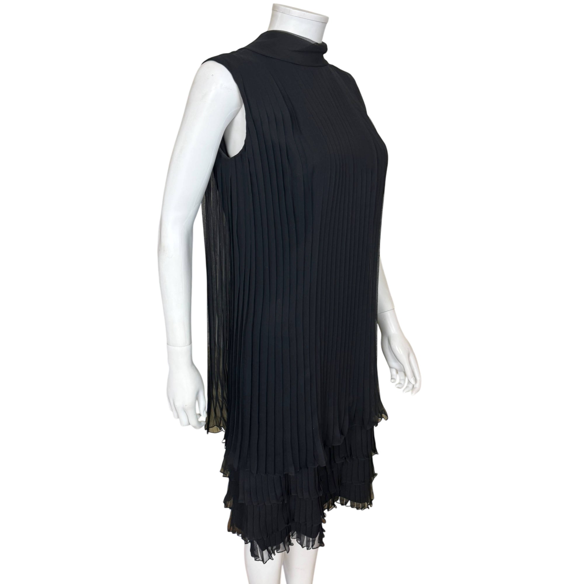 Angled view of vintage 1960s black chiffon pleated shift dress 