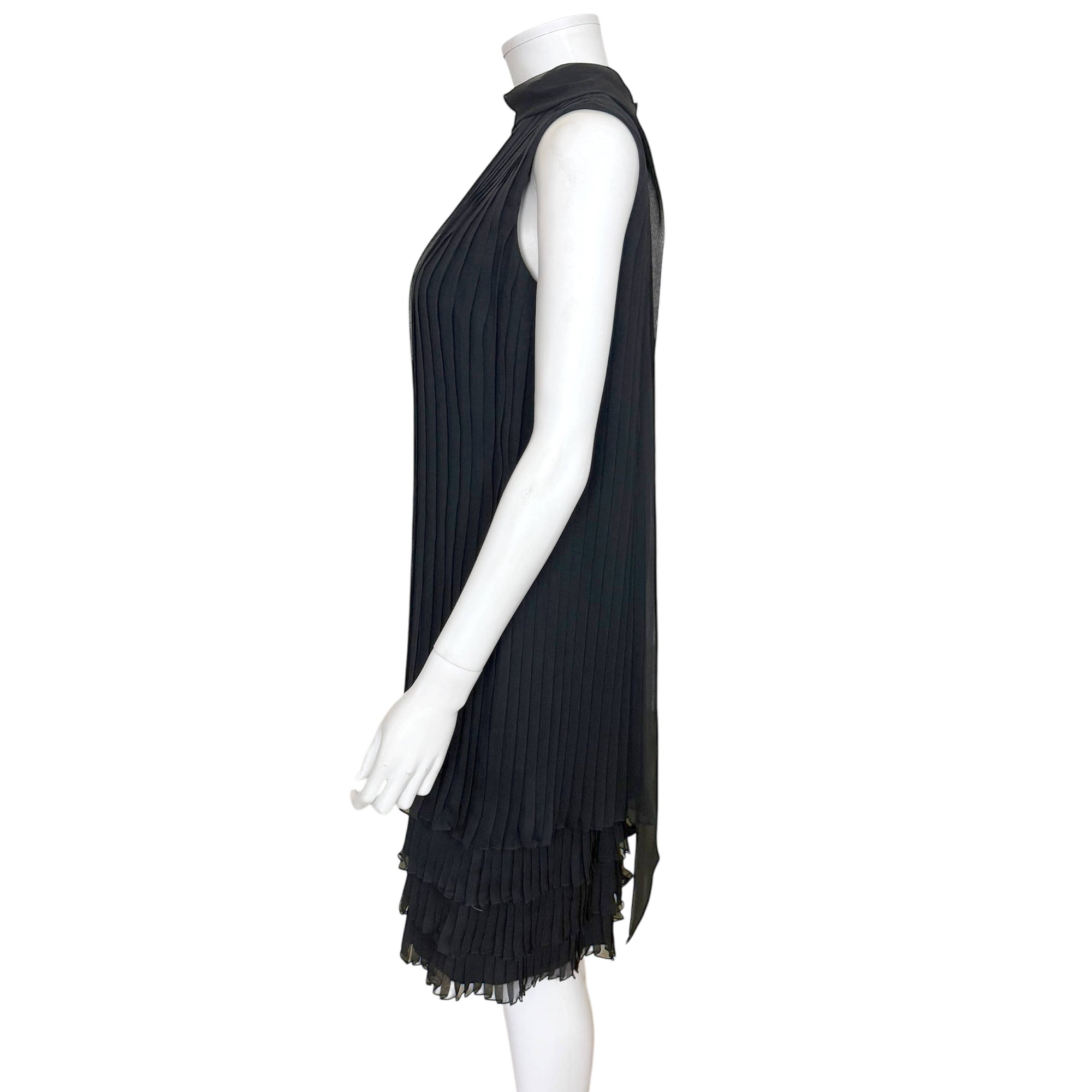 Side view of vintage 1960s black chiffon pleated sleeveless shift dress 