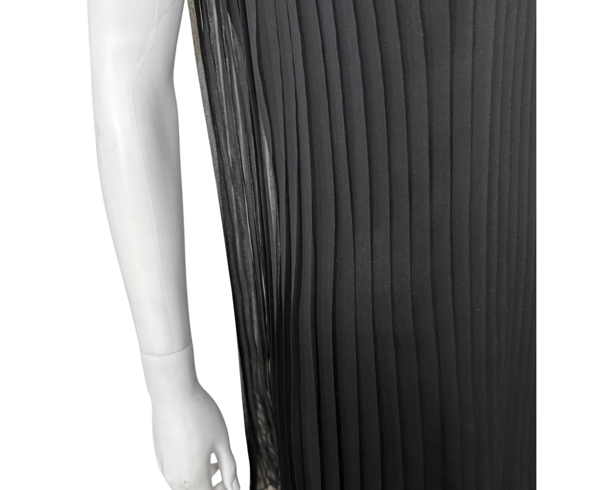 Detail of Angled view of vintage 1960s black chiffon pleated shift dress 