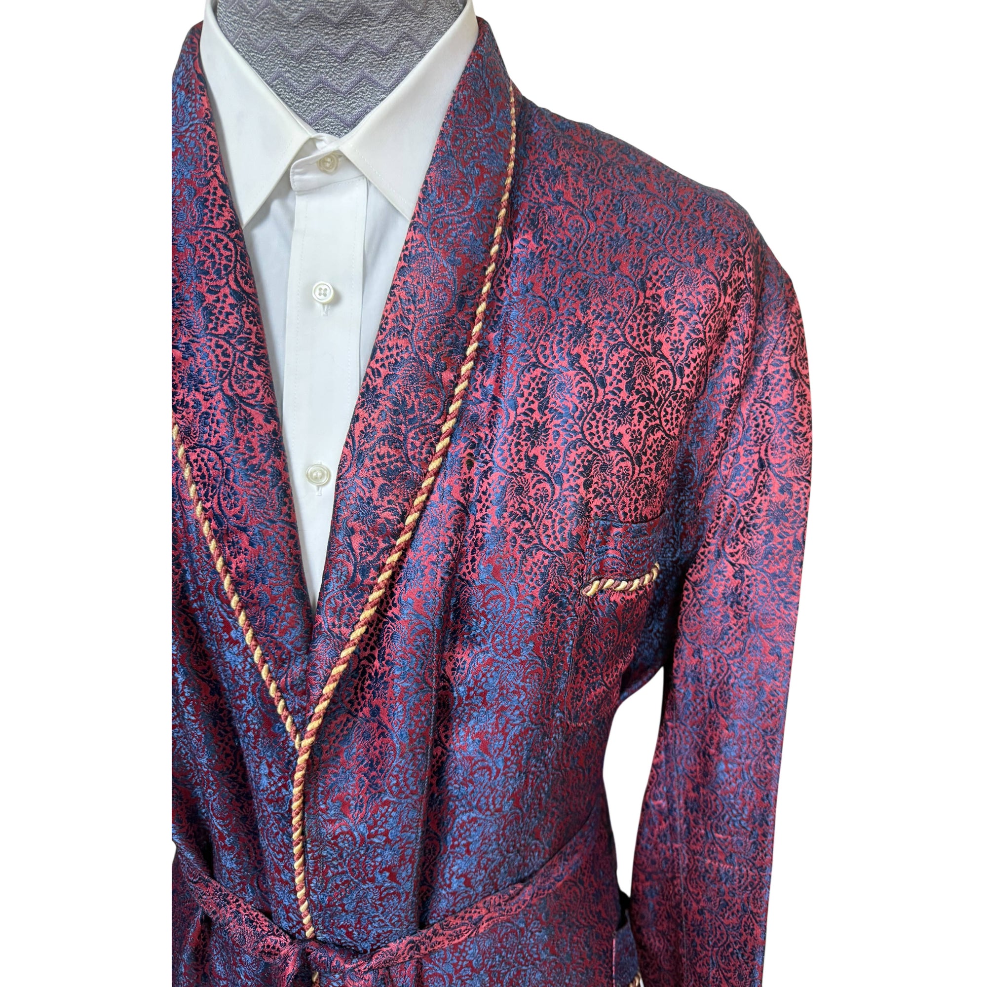 Close up vintage brocade dressing gown purplish red and blue