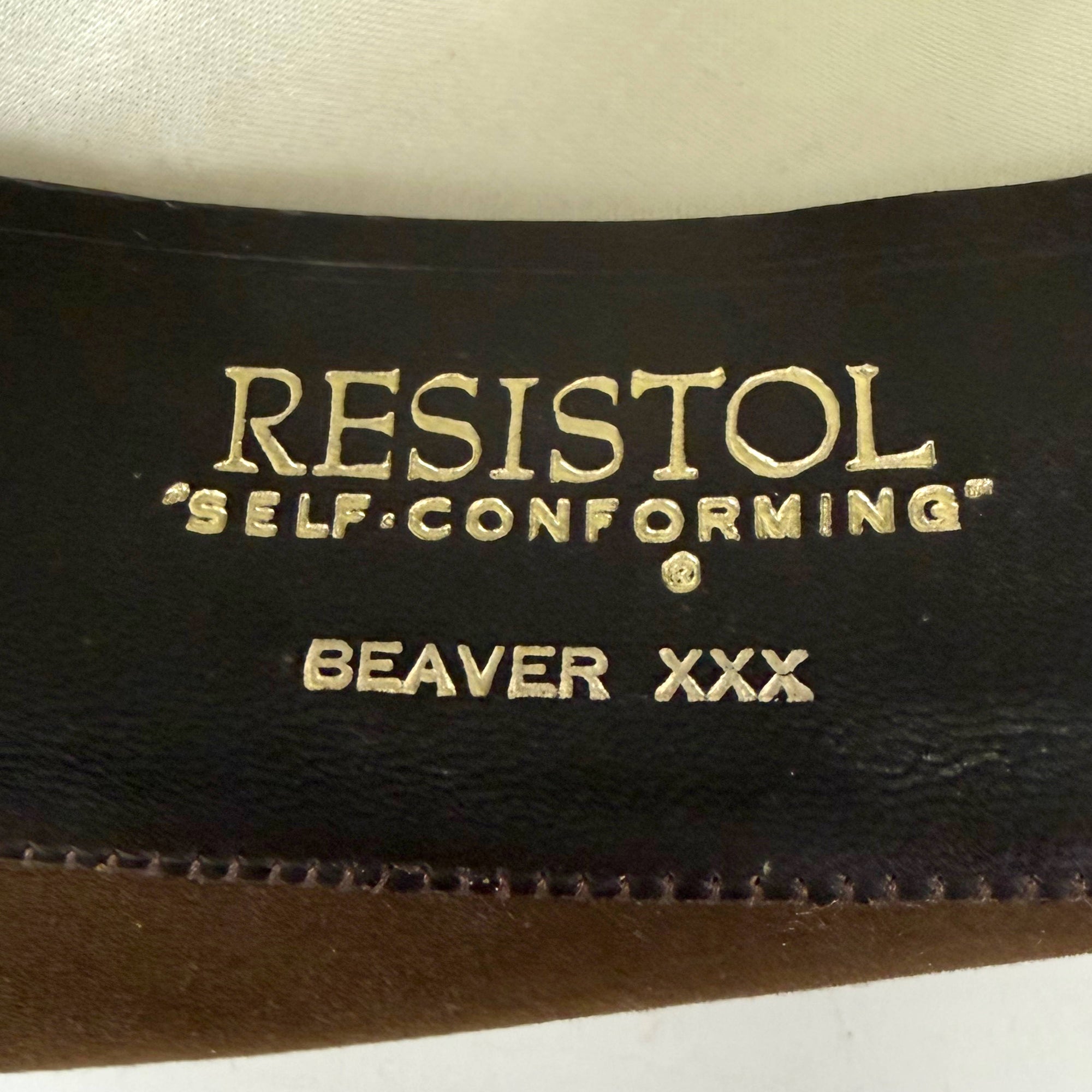 Close-up of Resistol Self Conforming Beaver XXX gold sweatband stamp