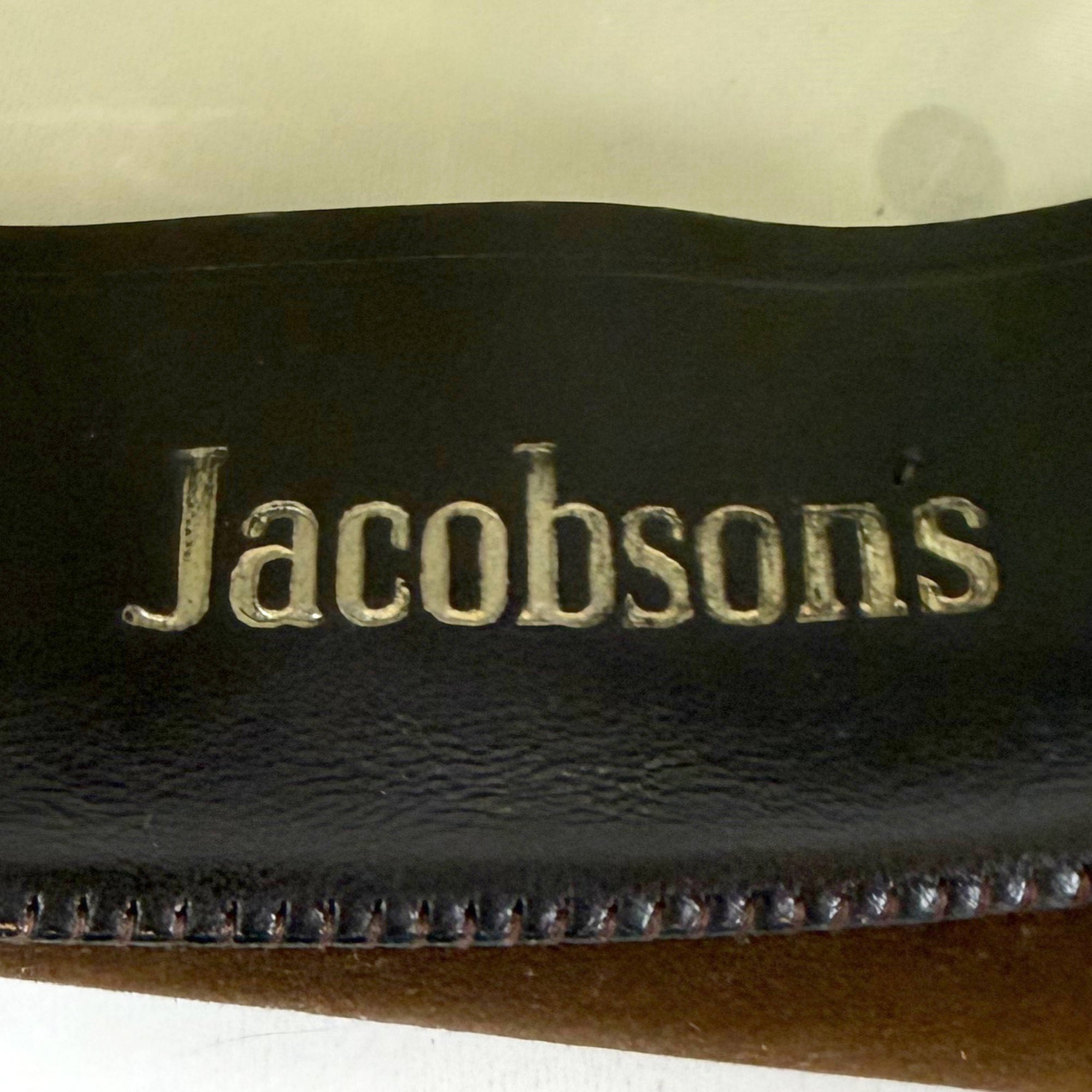 Close-up of Jacobsens retailer stamp inside vintage Resistol fedora