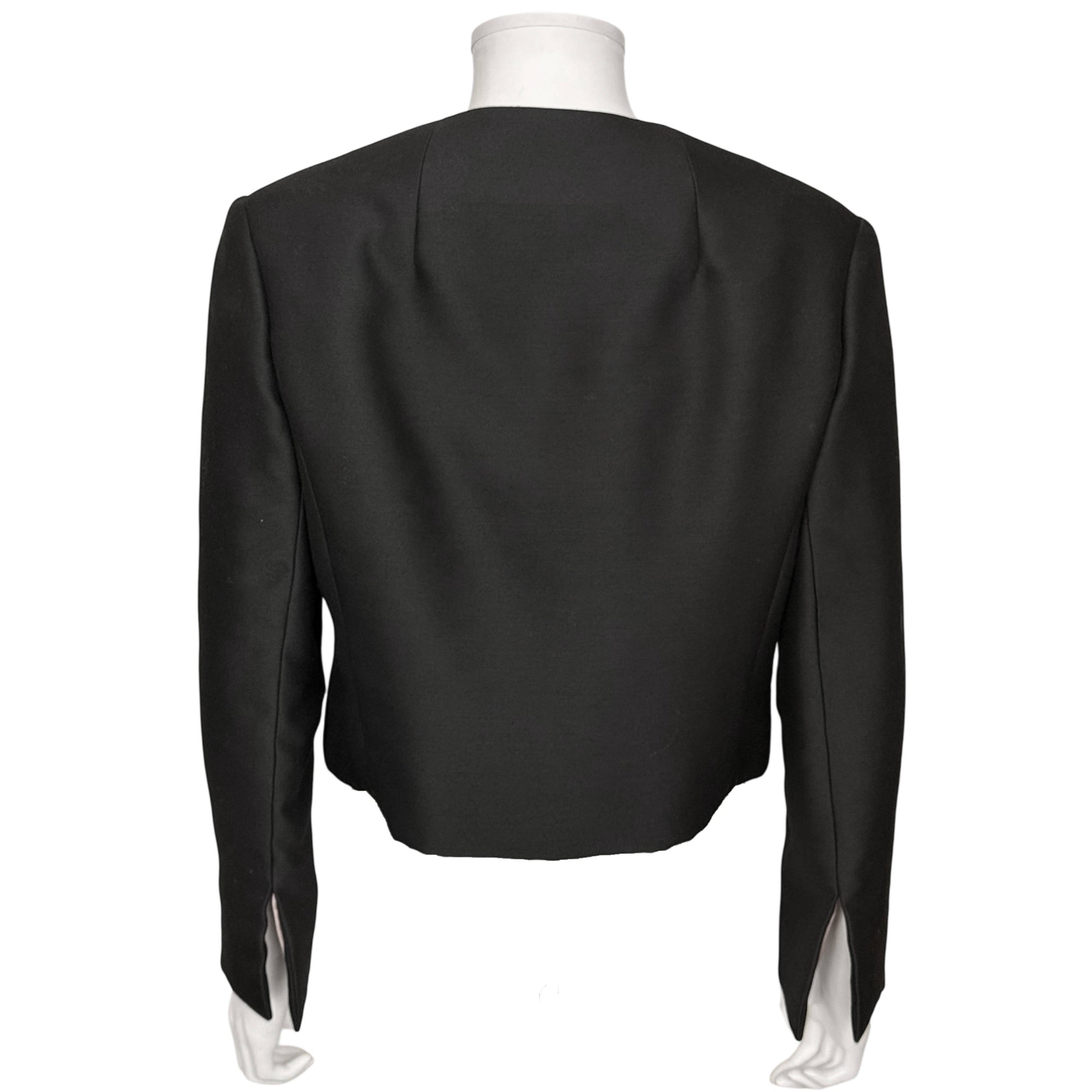 Back view of vintage 1960s black silk cropped evening jacket 