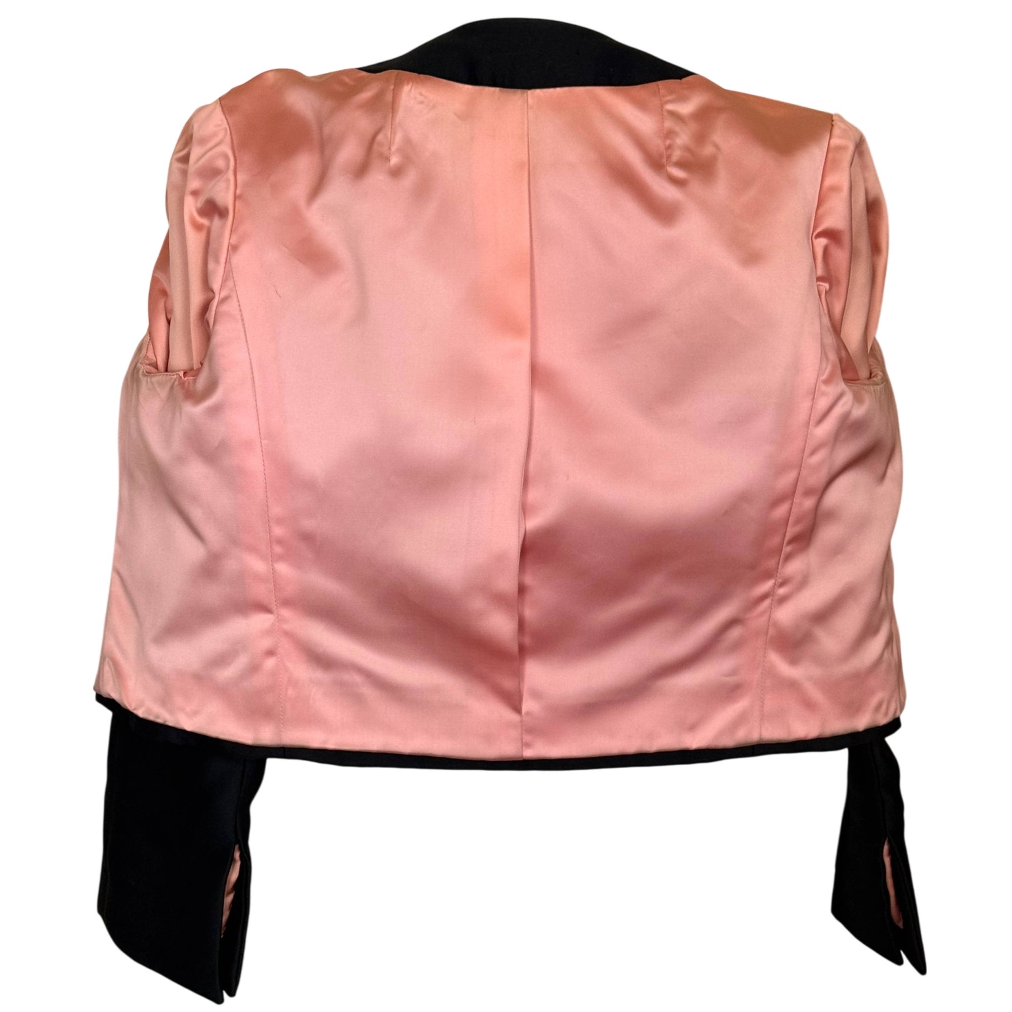 View of lining of vintage 1960s black silk cropped evening jacket 
