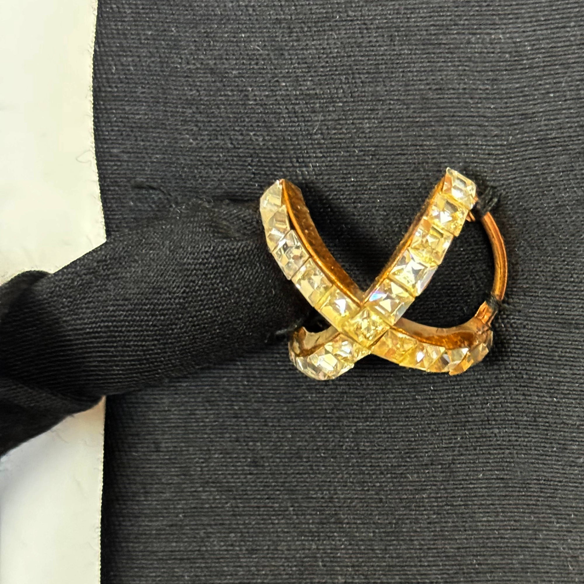 Detail of vintage 1960s black silk cropped evening jacket 