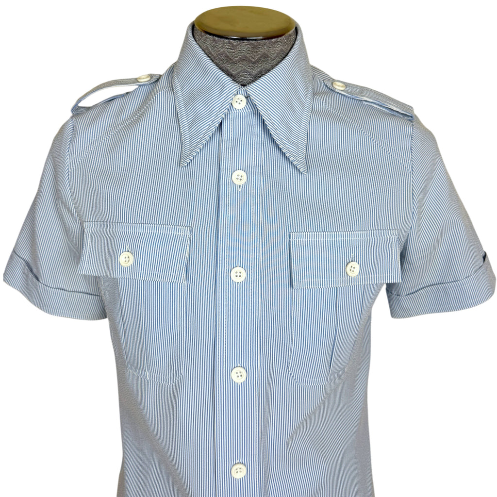 1970s seersucker safari-style jacket buttoned at the neck

