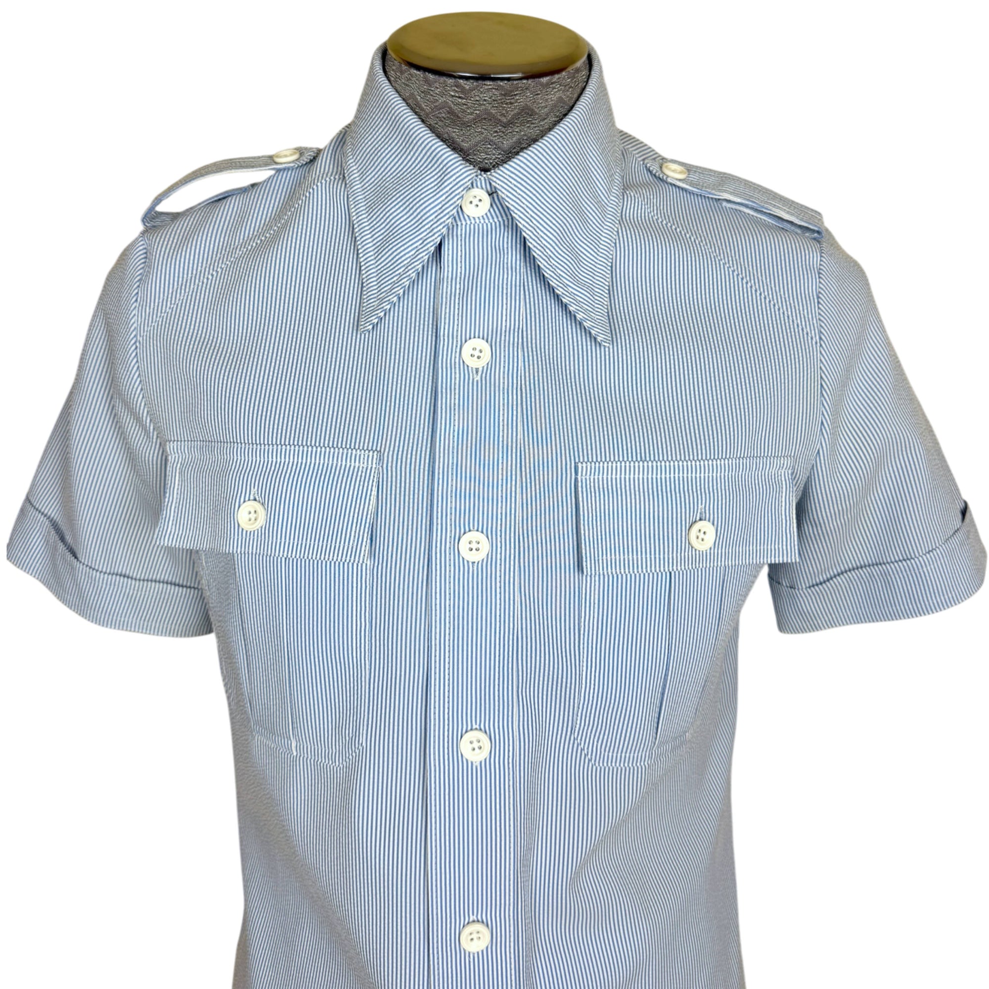 1970s seersucker safari-style jacket buttoned at the neck
