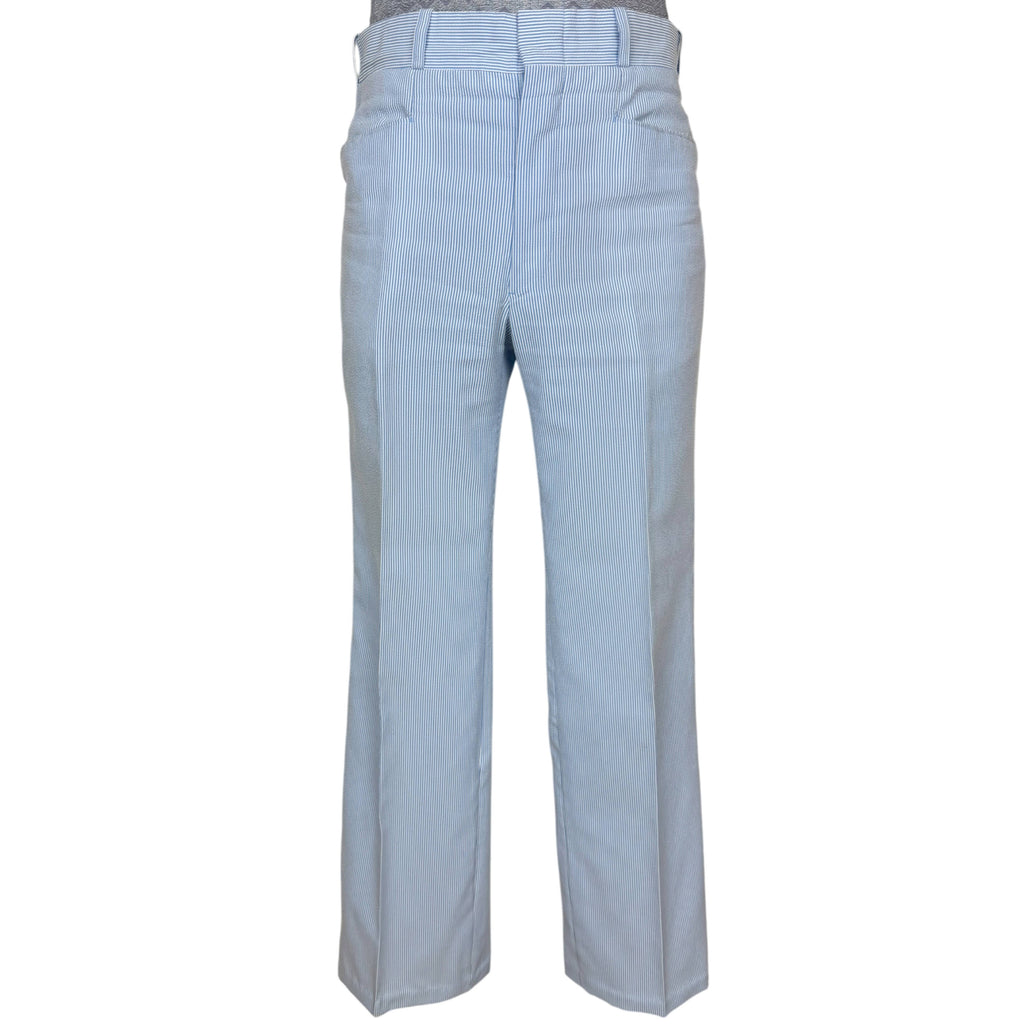 Matching blue and white seersucker flared trousers front