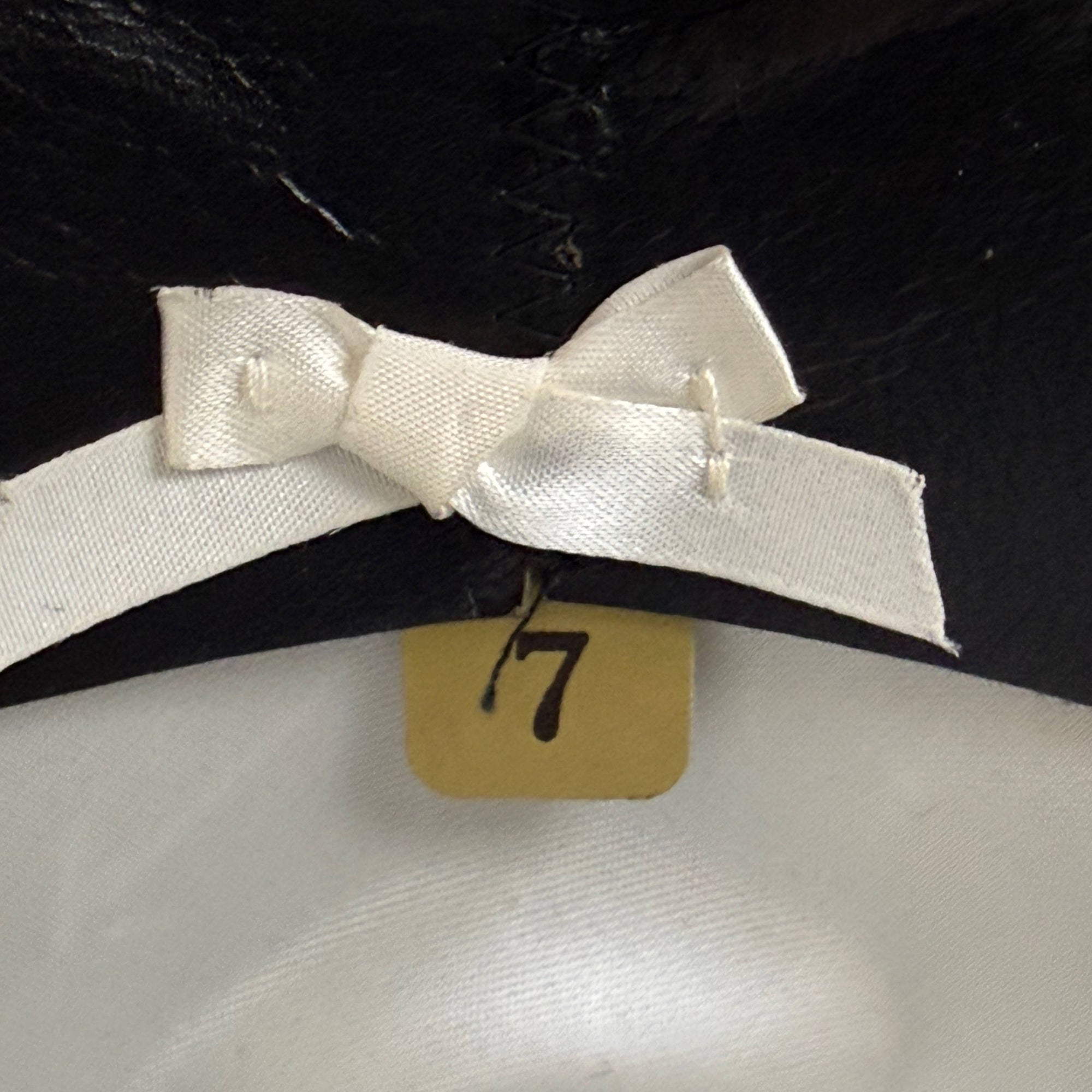 Vintage fedora size 7 tag and interior bow detail