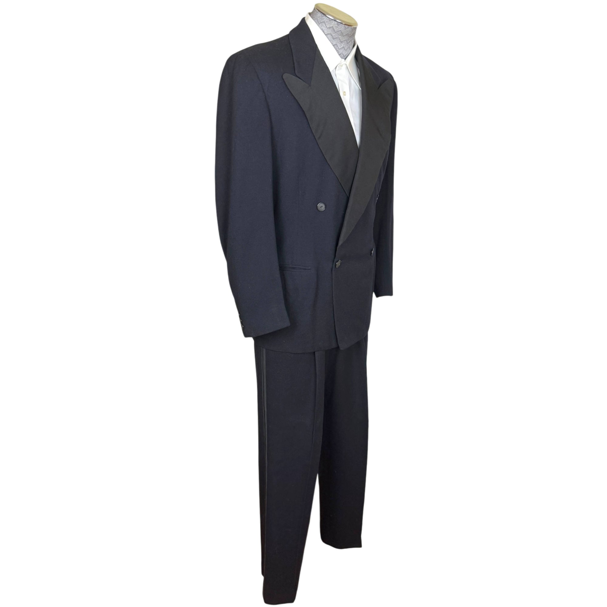 angled view of 1940s double breasted navy tuxedo with black peak lapels