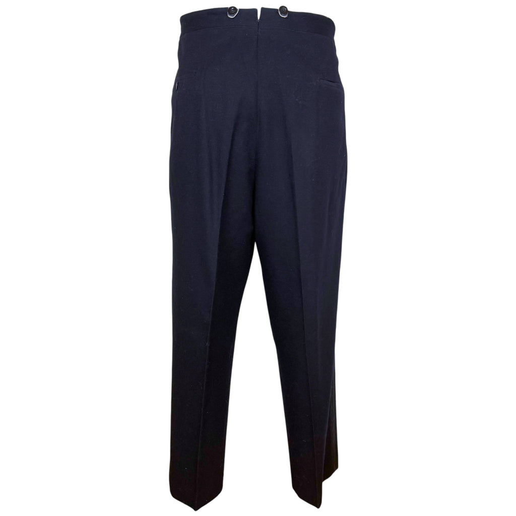 back view of matching high-waisted pleated tuxedo trousers