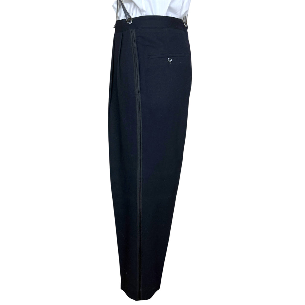 side view of matching high-waisted pleated tuxedo trousers