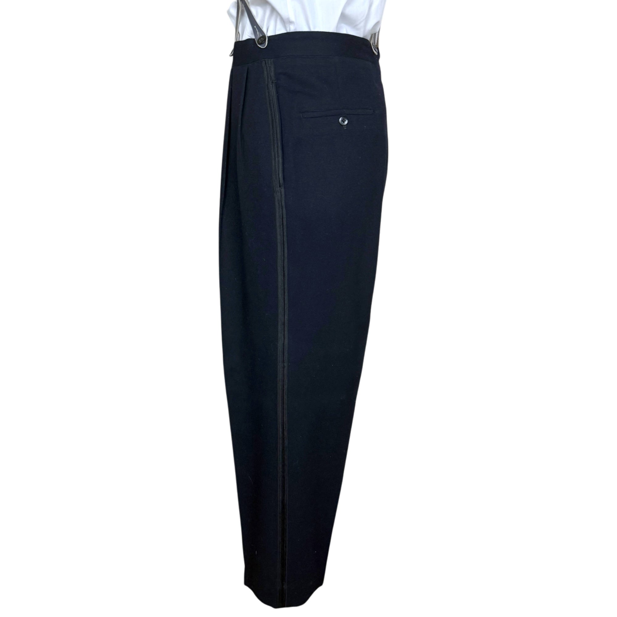 side view of matching high-waisted pleated tuxedo trousers