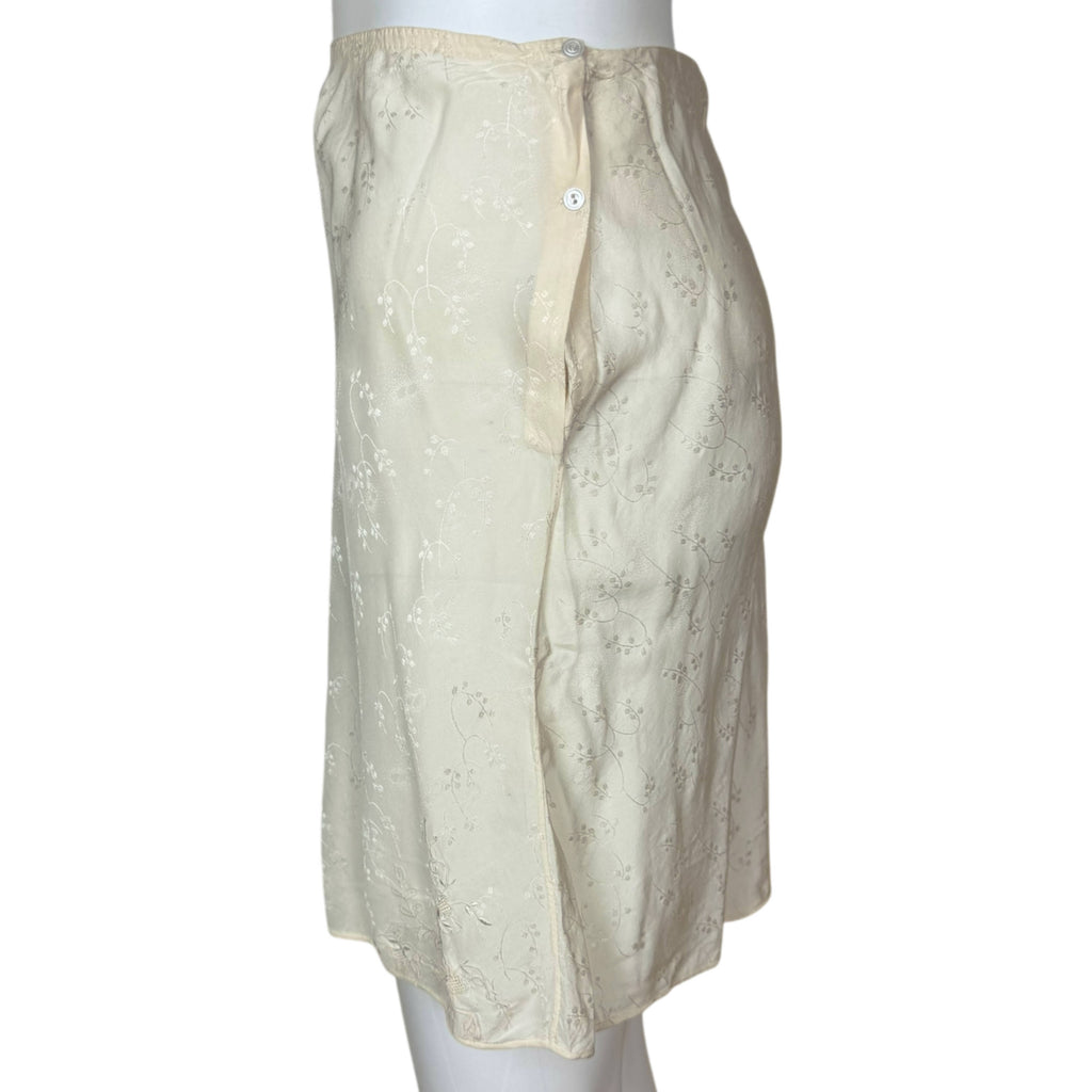 side view with button opening of 1930s silk step in panties