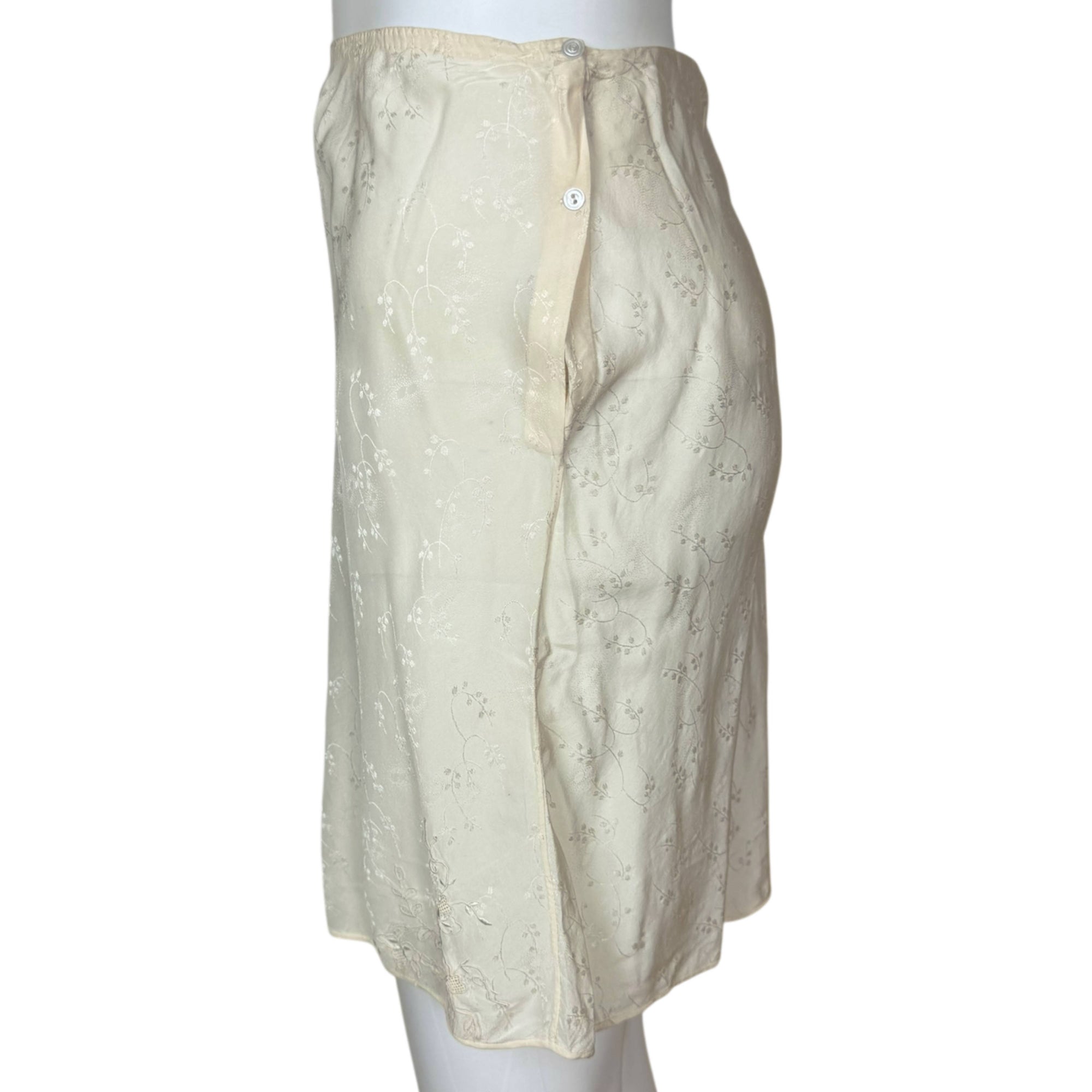 side view with button opening of 1930s silk step in panties